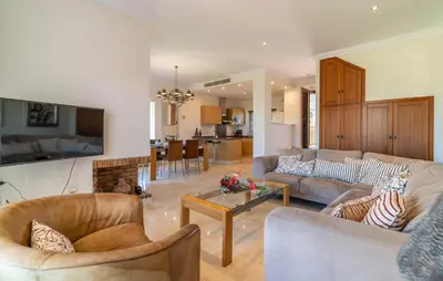 a living room with two couches and a table at Pet Friendly Home In Arcos De La Frontera in Arcos de la Frontera