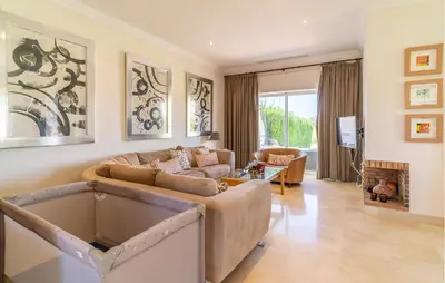 a living room with a couch and a table at Pet Friendly Home In Arcos De La Frontera in Arcos de la Frontera