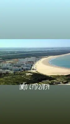 an aerial view of a beach and the ocean at Valdelagrana del Mar in El Puerto de Santa María