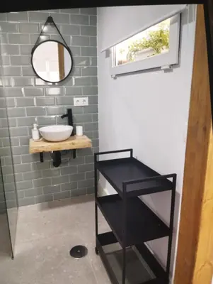 a bathroom with a sink and a mirror at Estudio Álvaro in Cádiz