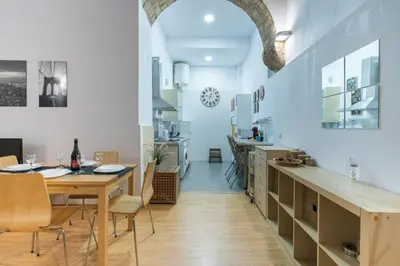 a dining room and kitchen with a table and chairs at CDZ - Santiago Terry in Cádiz