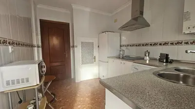 a kitchen with a sink and a counter top at Camaron Beach House By Sanlúcar Housing in Chipiona
