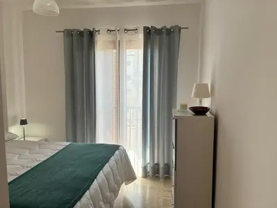 a living room with a couch and a table at Apartamento LA CARRAJOLILLA in Chiclana de la Frontera