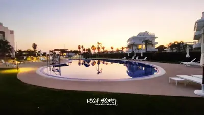 a large swimming pool in the middle of a resort at Apartamento Eleven View Costa ballena MOON BLACK in Costa Ballena