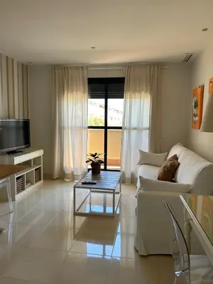 a living room with a couch and a coffee table at Apartment with terrace Jerez Norte Hipercor in Jerez de la Frontera