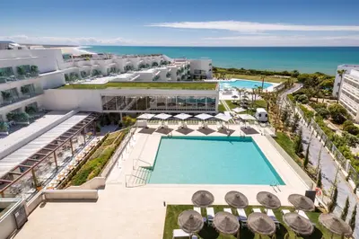 an aerial view of a resort with a swimming pool at Grupotel Conil Playa - Adults Only Recommended in Conil de la Frontera