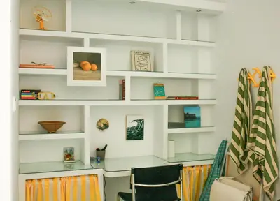 a room with white shelves and a desk at Caleta Club - Rooftop Villa, Cádiz in Cádiz