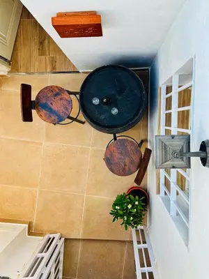a bathroom with a tub in the corner of a room at Loft Alegría de Jerez in Jerez de la Frontera