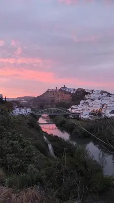 a view of a beach with a boat in the water at Apartamento Molino de Algarrobo in Arcos de la Frontera