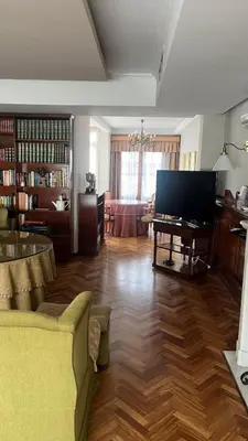 a living room with a couch and a piano at Apartamento centrico, 5 bedrooms, 5 baños en-suite in Jerez de la Frontera