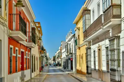 an empty street in a city with buildings at Holiday Homes - Los Ángeles de Costa Ballena in Chipiona