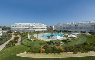 an aerial view of a resort with a swimming pool at Holiday Homes - Ocean Costa Ballena in Cádiz