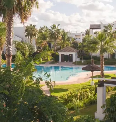 a view of the pool at the resort at Blue Moon House Costa Ballena by Sanlúcar Housing in Costa Ballena