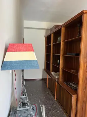 a lamp sitting on top of a eiffel tower at Brand new apartment in the heart of Jerez! in Jerez de la Frontera