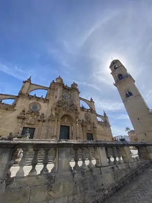 an old building with a clock tower on top of it at La Bohéme in Jerez de la Frontera