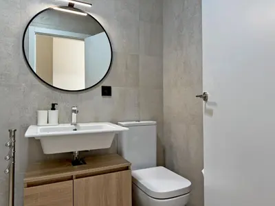 a bathroom with a sink and a mirror at La Solera de Jerez - Ole Solutions in Jerez de la Frontera