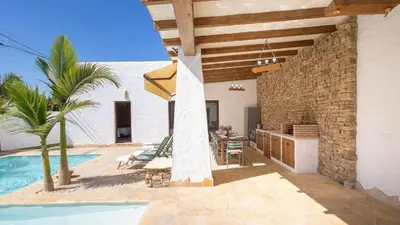 a villa with a swimming pool and a house at Galdana Chiclana de la Frontera by Ruralidays in Chiclana de la Frontera