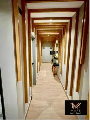 a hallway of a building with a long corridor at Mape Loft Rural Aljibe in Algar