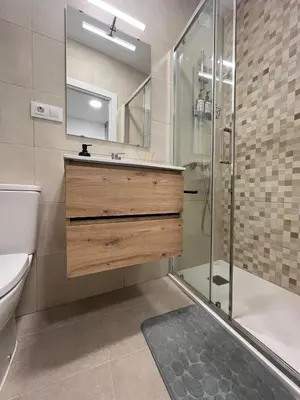 a bathroom with a sink and a shower at La Gañanía in Jerez de la Frontera