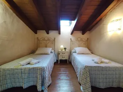 a bedroom with two beds in a room at Casa Sebas in Conil de la Frontera