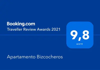a blue box with the text traveler review awards on it at Apartamento Bizcocheros con piscina y jardín privado in Jerez de la Frontera