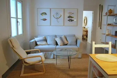 a living room with a couch and a table at Tacita Investments,SL in Cádiz