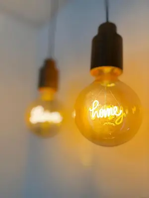 two lights with the word home written on them at Loft Mamalú Jerez in Jerez de la Frontera