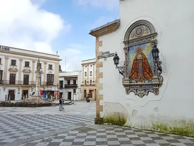 a painting on the side of a building at Casa Remedios in Jerez de la Frontera