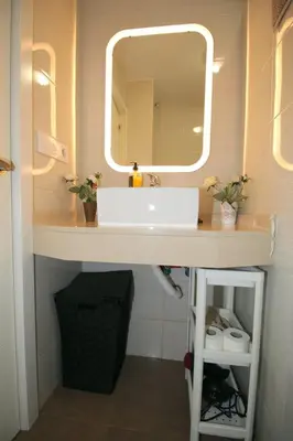a bathroom with a sink and a mirror at Buleria in Jerez de la Frontera