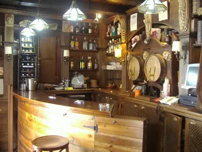 a bar with a wooden counter in a room at DescubreHome Sacramento in Cádiz