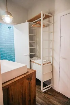 a bedroom with a bed and a closet at Apartamento en pleno centro de Jerez con patio privado in Jerez de la Frontera