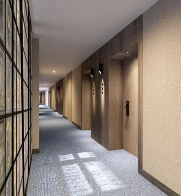 a hallway with wooden walls and a long row of doors at Gran Hotel Luna de Cádiz in Cádiz