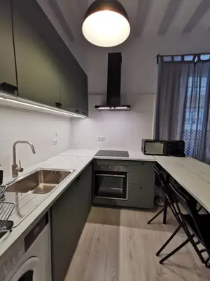 a kitchen with a sink and a counter top at CDZ - Buenos Aires en Cádiz in Cádiz