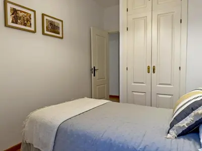 a bathroom with a toilet and a sink and a shower at Apartamento Antique Muralla - Ole Solutions in Jerez de la Frontera
