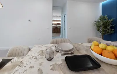 a dining room table with a bowl of fruit on it at 1 Bedroom Nice Apartment In Arcos De La Frontera in Arcos de la Frontera
