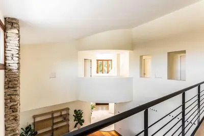 a staircase in a house with white walls at A paradise with ocean views in Conil de la Frontera