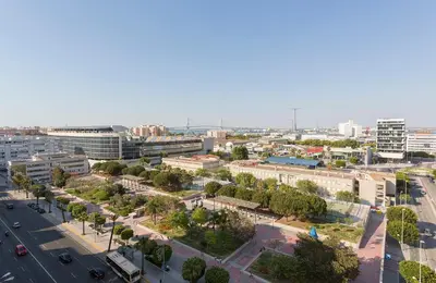 an aerial view of a city with buildings and a street at Ático Avda Cádiz Playa in Cádiz