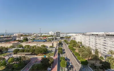an aerial view of a city with buildings and a street at Ático Avda Cádiz Playa in Cádiz