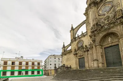 an old church with stairs in front of it at Allo Apartments Catedral Centro 3 Habitaciones in Jerez de la Frontera