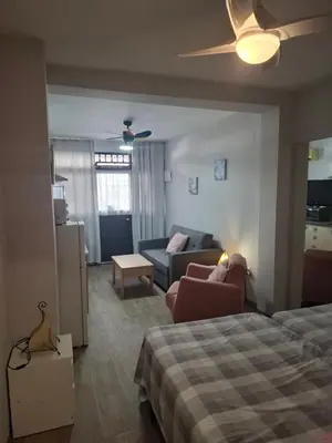 a shower with a glass door in a bathroom at Apartamento Playa Enamorados in El Puerto de Santa María