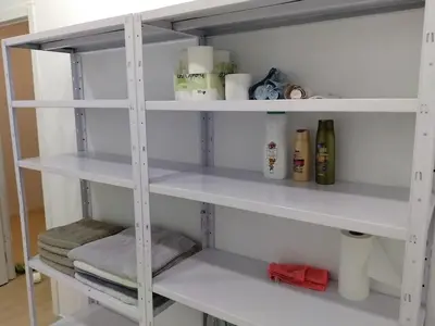 a white pantry with white shelves in a room at Cádiz bahía in Cádiz