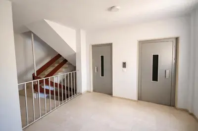 a hallway with two doors and a staircase at SOTAVENTO Apartment by Cadiz4Rentals in Cádiz