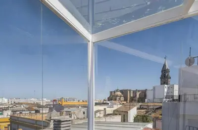 a view of a city from a window at Casa MILANO JEREZ 1 in Jerez de la Frontera
