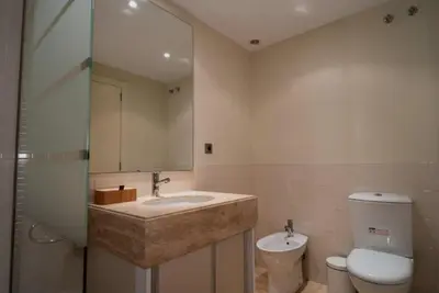 a bathroom with a sink and a toilet at New Golf Villa and Pool - Families Only in Barrio de Jarana
