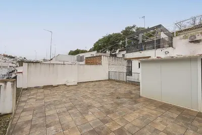 an empty parking lot in the middle of a building at El Mirador de Arcos in Arcos de la Frontera