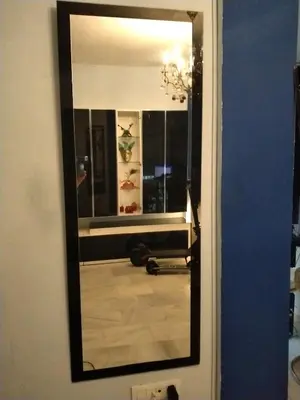 a mirror on a wall in a room at En el centro de todo in Puerto Real