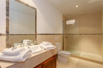 a bathroom with a sink and a toilet and a shower at Villa 236 by Villamya in Arcos de la Frontera