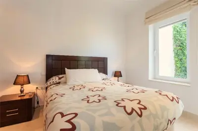 a bedroom with a large bed and a window at Villa 236 by Villamya in Arcos de la Frontera