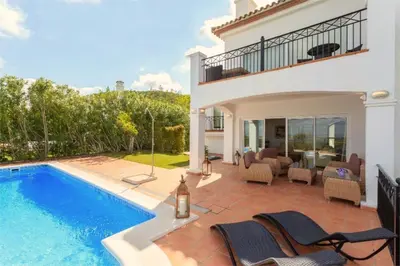 a villa with a swimming pool and a house at Villa 236 by Villamya in Arcos de la Frontera