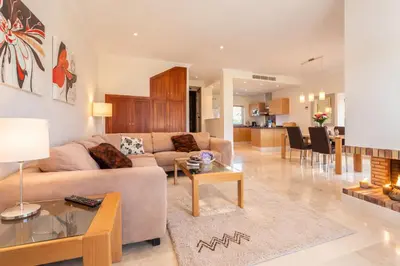 a living room with a couch and a table at Villa 231 by Villamya in Arcos de la Frontera